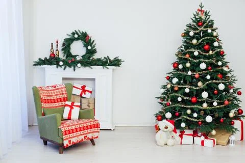 Christmas tree pine with fireplace interior of the house new year decoration Stock Photos