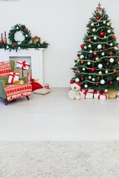 Christmas tree pine with fireplace interior of the house new year decoration Stock Photos