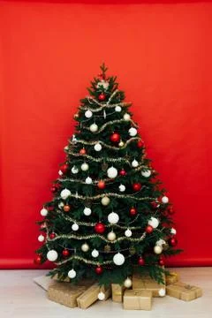 Christmas tree pine red interior house new year decor garland gifts postcard 스톡 사진