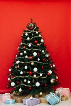 Christmas tree pine red interior house new year decor garland gifts postcard 스톡 사진