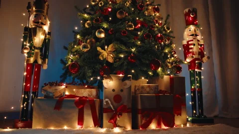 Christmas tree with presents and nutcracker in the house 스톡 동영상 221924733