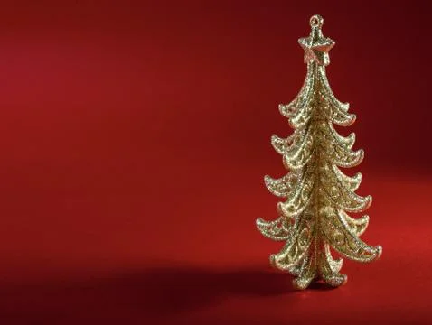 Christmas tree on red background Stock Photos