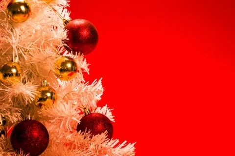 Christmas tree on red background Stock Photos