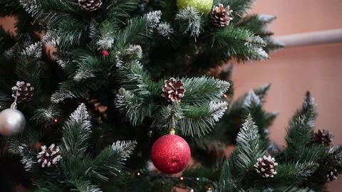 Christmas tree with red ball close-up, New year festive background,horizontal 4k Stock Footage 258052449