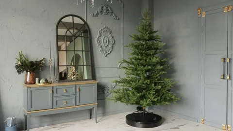 Christmas tree revolves around itself in the interior Stock Footage 165382952