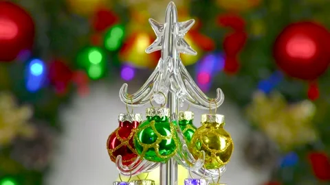 Christmas tree rotates against the background of a large Christmas wreath Stock Footage 201917294