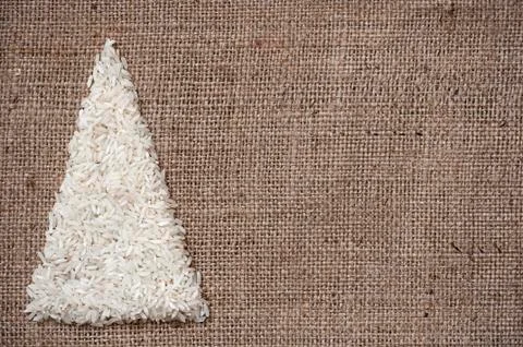 Christmas tree on sack background Stock Photos