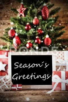 Christmas Tree With Seasons Greetings Stock Photos