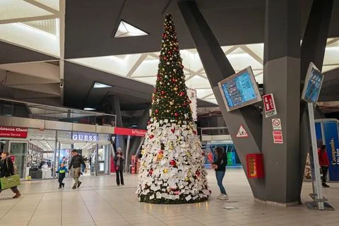 The Christmas tree set up in the central train station in Naples, Italy. Stock Photos