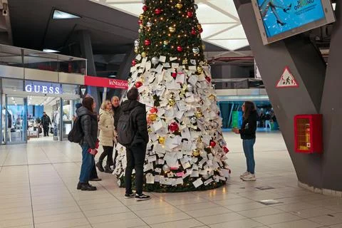 The Christmas tree set up in the central train station in Naples, Italy. Stock Photos