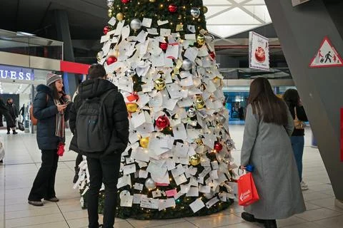 The Christmas tree set up in the central train station in Naples, Italy. Stock Photos