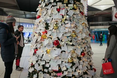 The Christmas tree set up in the central train station in Naples, Italy. Stock Photos