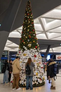 The Christmas tree set up in the central train station in Naples, Italy. Stock Photos