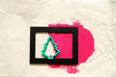 Christmas tree shape and red sand Foto stock