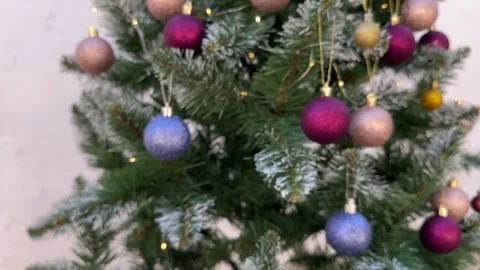 Christmas tree with shiny balls hitting the camera bokeh Stock Footage 255037726