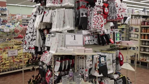 The Christmas Tree Shops retail store tilt of a Mickey Mouse themed display Stock Footage 161525476