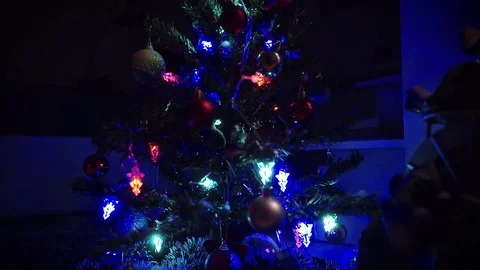 Christmas tree sparkling in the dark. Slider shot. Stock Footage 70354741