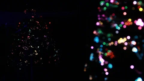 Christmas tree spins with reflection on the window. Stock Footage 82744510