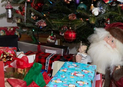Christmas tree surrounded by presents Stock Photos