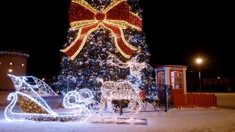 Christmas tree in town square, aerial smooth motion Stock Footage 101094236