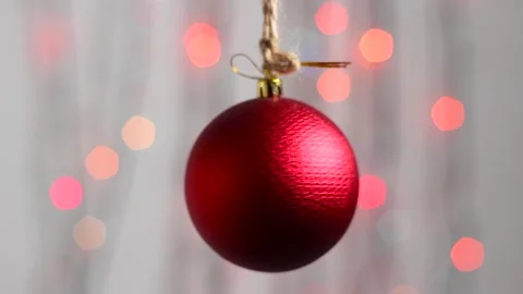 Christmas tree toy in the form of a red sphere. Close-up. Stock Footage 143587555