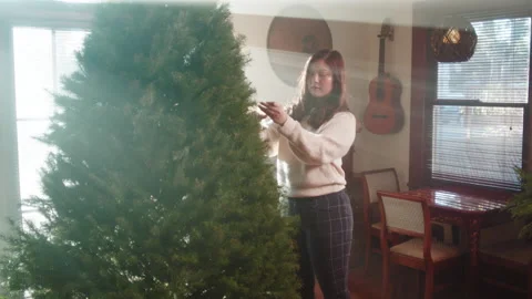Christmas Tree Trimming And Set Up 6K 48FPS SLO-MO Stock Footage 144285960