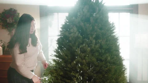 Christmas Tree Trimming And Set Up 6K 48FPS SLO-MO Stock Footage 144286751
