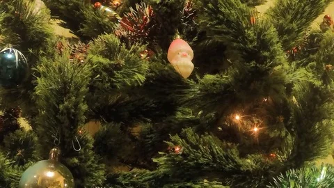 Christmas tree with twinkle lights and tinsel at new year timelapse Stock Footage 79814007