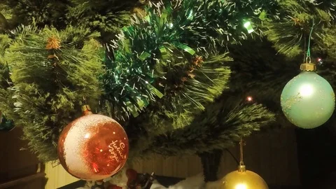 Christmas tree with twinkle lights and tinsel at room timelapse Stock Footage 79814063
