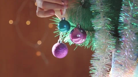Christmas tree, woman's hand decorating a Christmas tree. Stock Footage 143567153