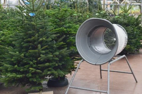 Christmas tree wrapping device Packed in a plastic net Stock Photos