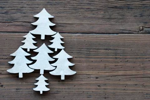 Christmas Trees On  Brown Wooden Background Stock Photos