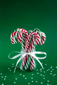Christmas vertical background with candy canes Stock Photos