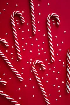 Christmas vertical background with candy canes Stock Photos