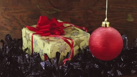 Christmas vintage present with rotating red globe Video stock 80350735