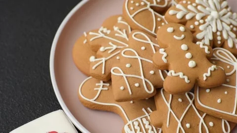 Christmas winter gingerbread, holiday biscuits on monochrome background Stock Footage 308564269