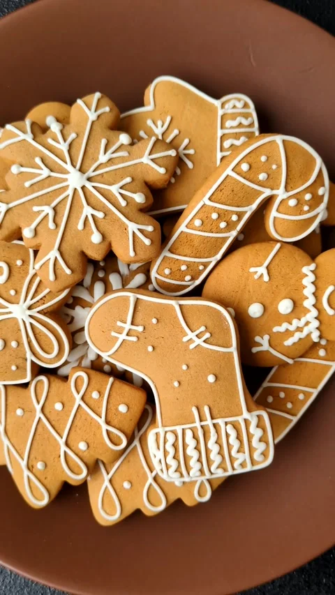 Christmas winter gingerbread, holiday biscuits on monochrome background Stock Footage 308564320