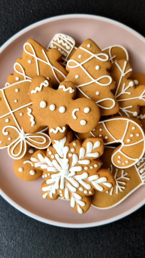 Christmas winter gingerbread, holiday biscuits on monochrome background Video stock 308564324