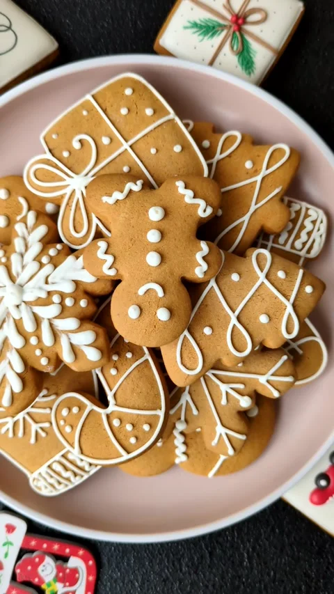 Christmas winter gingerbread, holiday biscuits on monochrome background Stock Footage 308564328