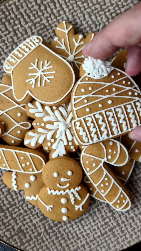 Christmas winter gingerbread, holiday biscuits on monochrome background Video stock 308564339