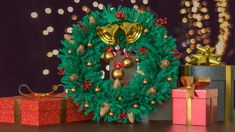 Christmas Wreath and Gift Boxes with Holiday Lights 3d render. Stock Illustration