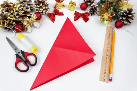 Christmas wreath made of colored paper. DIY concept. Handmade at home. Stock Photos