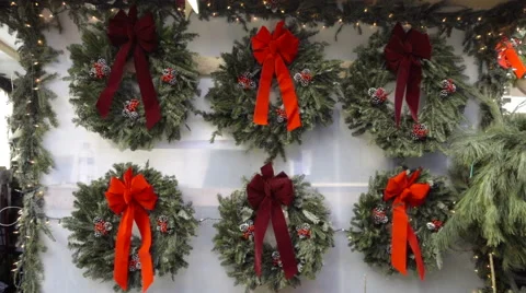 Christmas wreaths holidays with Evergreen trees for sale street Santa Claus NYC Stock Footage 59088186