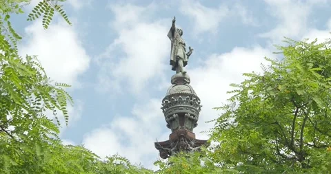 Christopher Columbus statue one day with clouds and blue sky in Barcelona Stock Footage 133963247