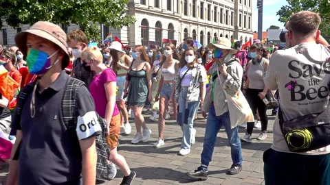 Christopher Street day with a large group of people moving through the city Stock Footage 159586493