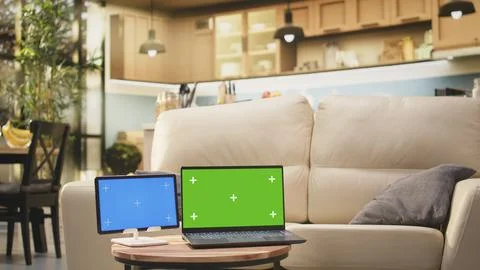 Chroma key and blue screen in living room indoors with coffee table Stock Photos