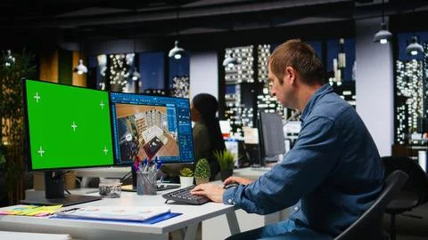 Chroma key and CAD program used by african american architectural specialist Stock-Fotos