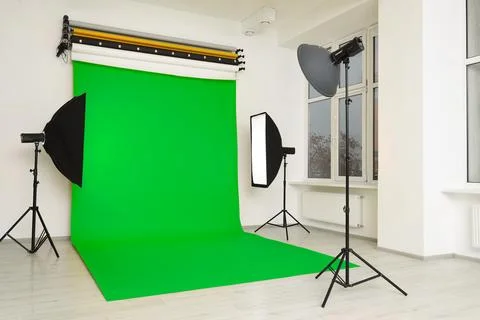 Chroma key compositing. Green backdrop and equipment in studio Stock Photos
