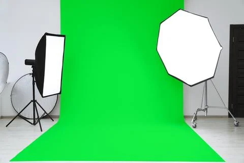 Chroma key compositing. Green backdrop and equipment in studio Stock Photos