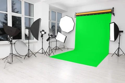 Chroma key compositing. Green backdrop and equipment in studio Stock Photos
